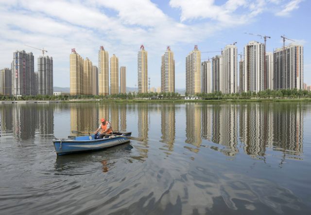 Εκτιμήσεις για πτώση 10% των τιμών των ακινήτων στην Κίνα το 2014