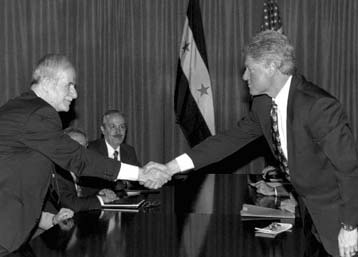 Ιστορικής σημασίας για την ειρήνη η συνάντηση Κλίντον – Ασαντ στη Γενεύη