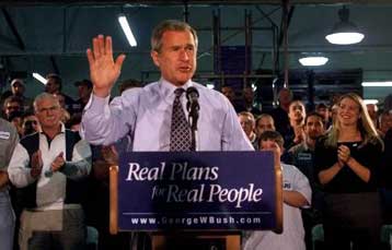 Γκορ και Μπους διασταυρώνουν τα ξίφη τους για το πετρέλαιο και το περιβάλλον