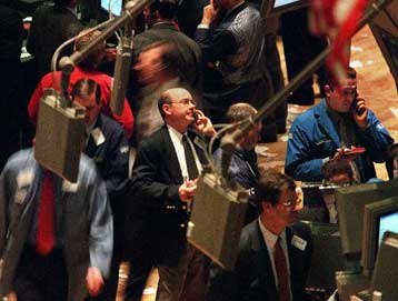 Μεικτή εικόνα για τη Γουόλ Στριτ την Τρίτη