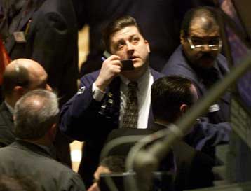 Η πτώση των επιτοκίων ωφελεί τις εταιρείες προσωπικών υπολογιστών και τηλεπικοινωνιών στη Γουόλ Στρι