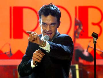 Φήμη πως ο Ρόμπι Ουίλιαμς υπέγραψε με την ΕΜΙ χαρίζει 5% στη μετοχή της εταιρείας