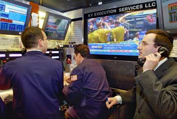 Με θετικό πρόσημο έκλεισαν την Τρίτη Nasdaq και Dow Jones