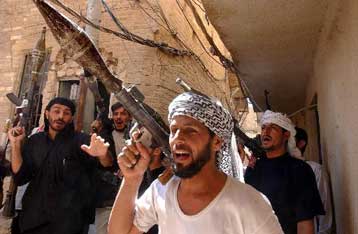 Συγκεχυμένες πληροφορίες για αποχώρηση των σιιτών ανταρτών από το τέμενος της Νατζάφ