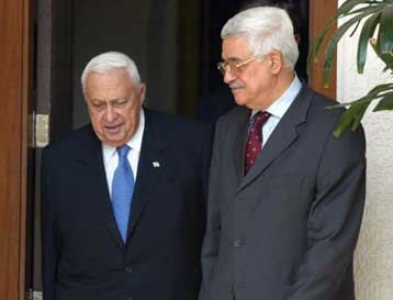 Συμφωνία κατάπαυσης του πυρός υπογράφουν την Τρίτη Σαρόν και Αμπάς