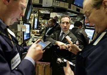 Μεικτές τάσεις επικράτησαν την Παρασκευή σε Γουόλ Στριτ και ευρωπαϊκά χρηματιστήρια