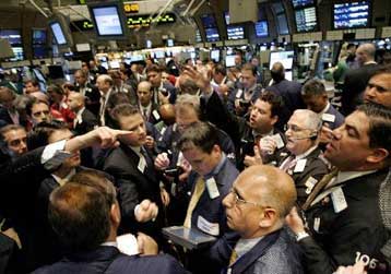 Αρνητικό πρόσημο σε Γουόλ Στριτ και ευρωπαϊκά χρηματιστήρια την Τρίτη