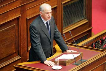 Σφοδρή κόντρα Καραμανλή – Παπανδρέου για τις υποκλοπές