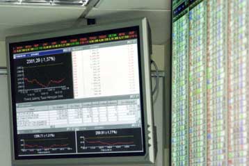 Χρηματιστηριακή συνεργασία με τη Σανγκάη φέρεται να συμφώνησαν Αλογοσκούφης, Καπράλος