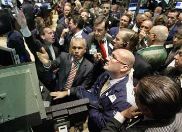 Οριακές απώλειες στη Γουόλ Στριτ, ανάκαμψη στις ευρωπαϊκές αγορές