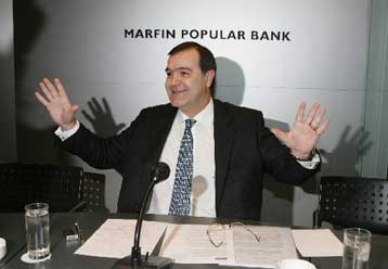 Πράσινο φως για την αύξηση του ποσοστού της Dubai Investment στην Marfin Popular