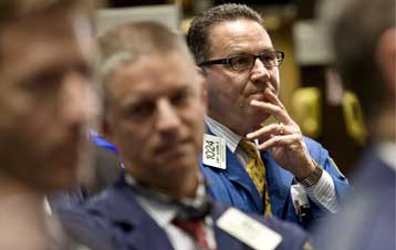 Λύση στο αδιέξοδο αναζητούν οι ΗΠΑ μετά την απόρριψη του σχεδίου Πόλσον