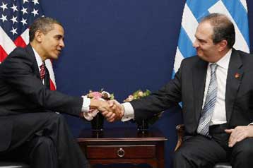 «Επίσημη πρώτη» Καραμανλή – Ομπάμα σε θερμό κλίμα