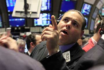 Κέρδη σε Γουόλ Στριτ και ευρωπαϊκά χρηματιστήρια την Παρασκευή