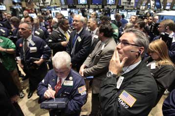 Με περιορισμένες απώλειες άνοιξε σε ΗΠΑ και Ευρώπη η χρηματιστηριακή εβδομάδα