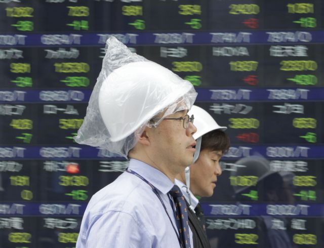 «Σεισμός» και στο χρηματιστήριο του Τόκιο, μετά το πυρηνικό ατύχημα στη Φουκουσίμα