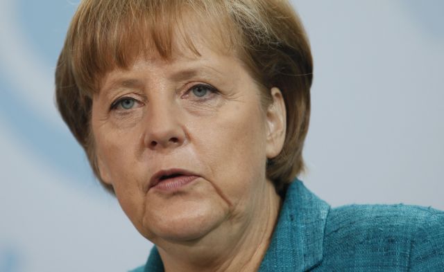 Εφαρμογή του Μνημονίου ζητεί η Μέρκελ και απορρίπτει την αναδιάρθρωση