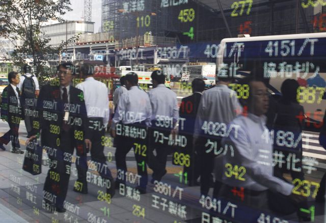 Θετικό κλίμα στις ασιατικές αγορές έφερε η επικείμενη παραίτηση Μπερλουσκόνι