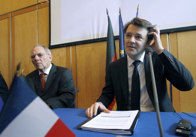 Συγκρατημένα αισιόδοξοι Μπαρουέν-Σόιμπλε για το ελληνικό PSI και την Ευρωζώνη