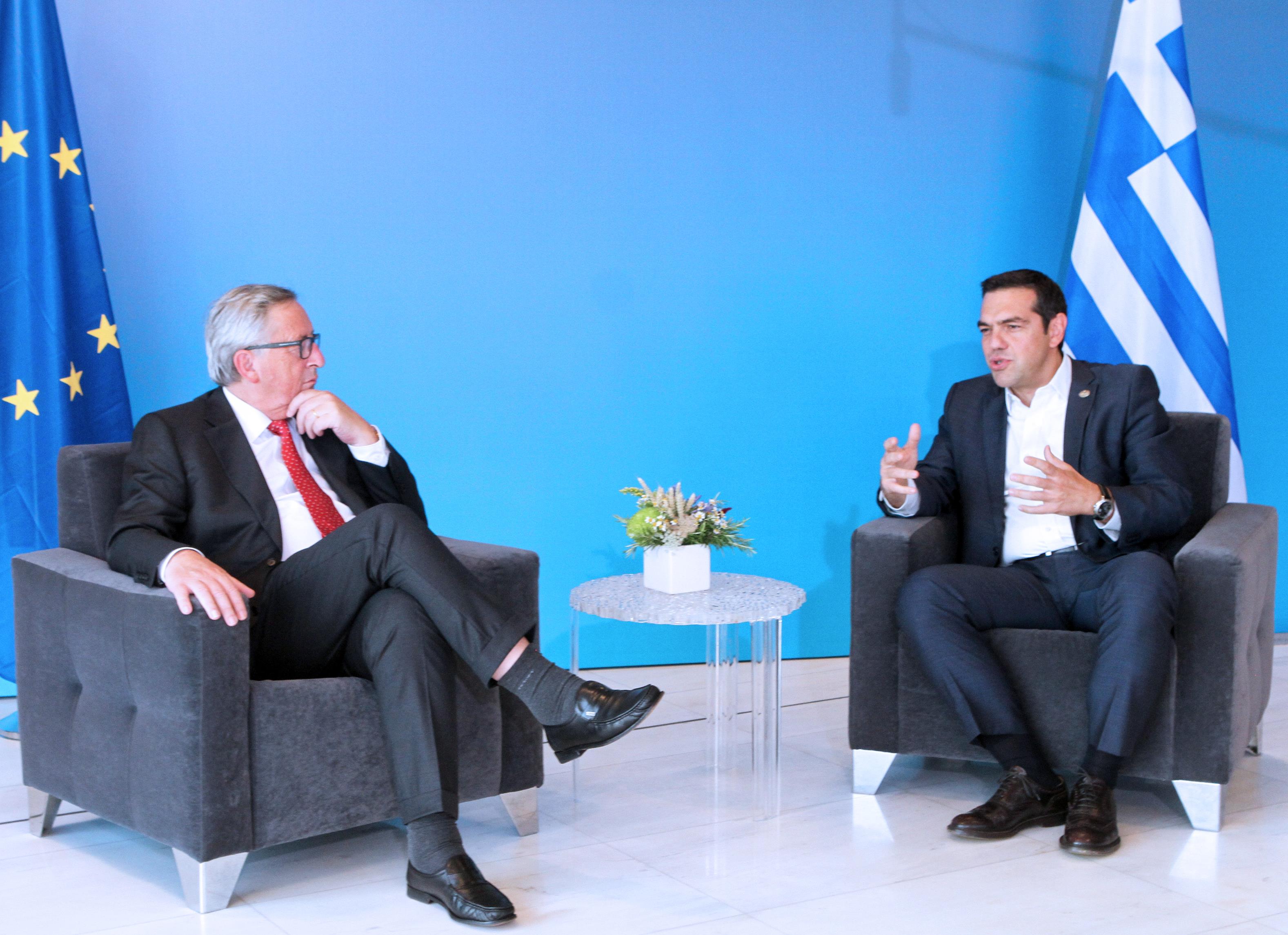 Τσίπρας προς Γιούνκερ: Είμαστε αποφασισμένοι να ανακάμψουμε