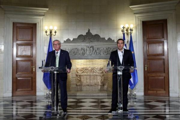 In a boost for government, Juncker sees clean exit from bailout, debt deal