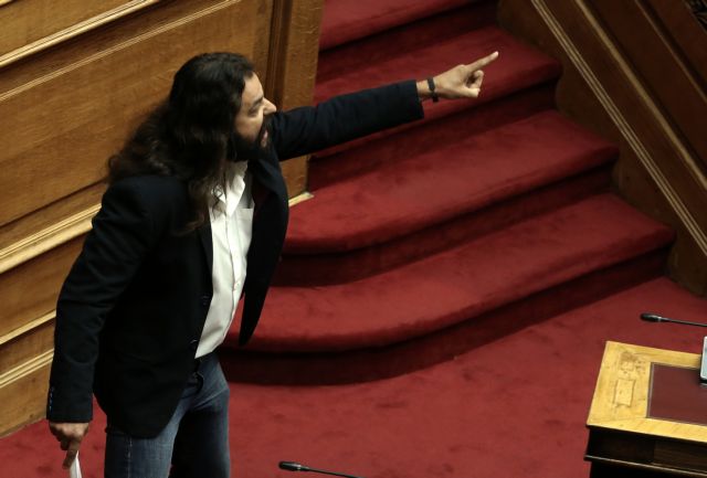Golden Dawn MP Barbarousis led to court to face high treason charges