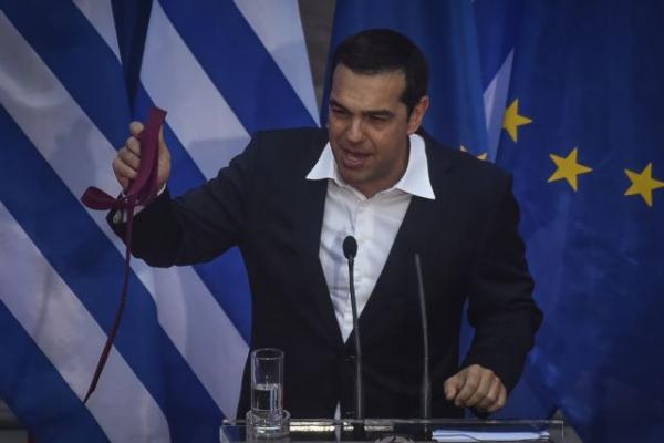 Με φόρους, περικοπές και εποπτεία πληρώθηκε η γραβάτα… Τσίπρα