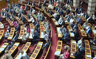 Με έντονες αντιπαραθέσεις ψηφίστηκε ο εφαρμοστικός νόμος