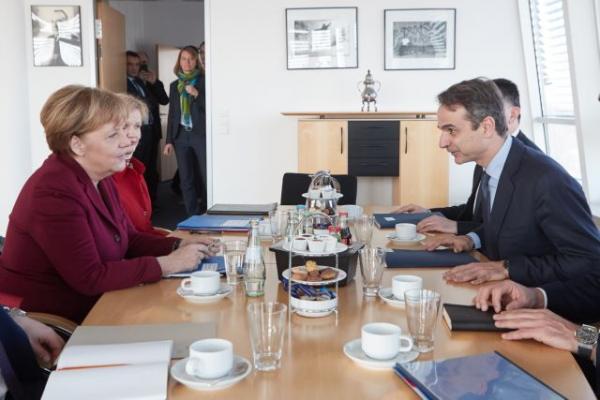 Merkel, Mitsotakis agree to disagree on Prespa Accord ratification