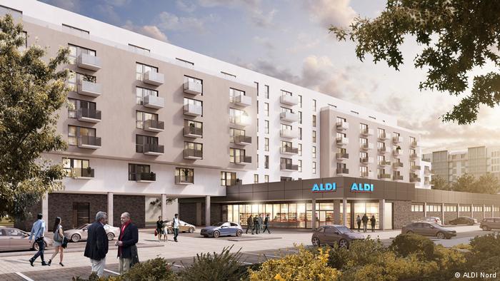 Σπίτια σε σουπερμάρκετ και πάρκινγκ