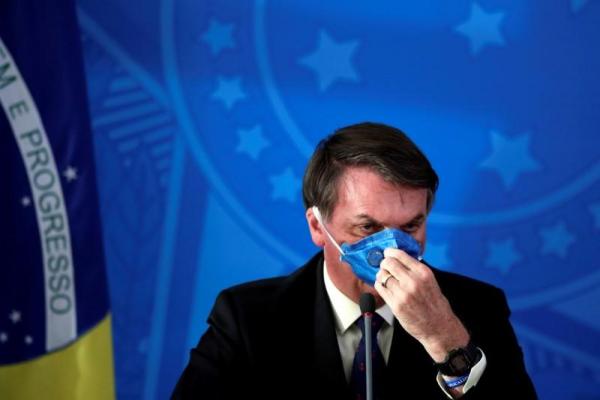 Ο κοροναϊός «γκρεμίζει» τον Μπολσονάρο – Φήμες για «βελούδινο» πραξικόπημα στη Βραζιλία