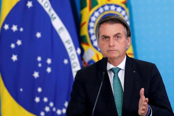 Η «γριπούλα» θερίζει στη Βραζιλία και ο Μπολσονάρο απειλεί με αποχώρηση από τον ΠΟΥ