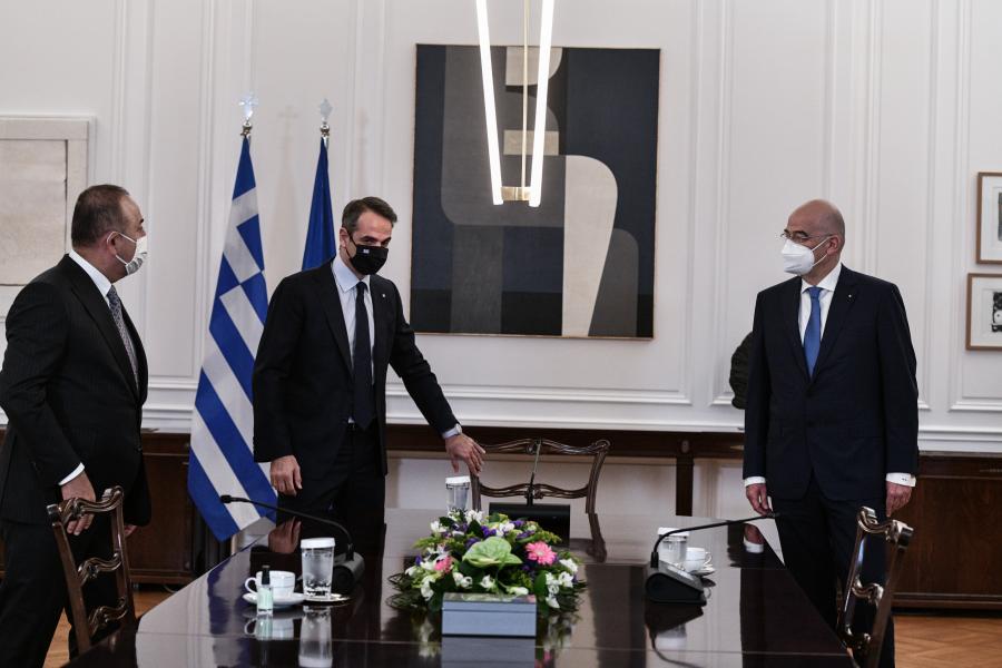 Cavusoglu visit spurs hopes of normalisation of Greek-Turkish relations through high-level talks