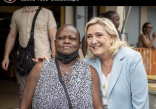 Μαρίν Λεπέν: Η viral φωτογραφία που αγκαλιάζει μαύρη γυναίκα σαν να σιχαίνεται