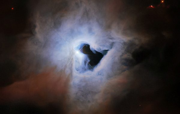 To διαστημικό τηλεσκόπιο Hubble κοιτάζει μέσα από μια κοσμική κλειδαρότρυπα
