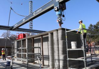 3D Printing σε νέα ύψη: Το πρώτο εκτυπωμένο τριώροφο σπίτι