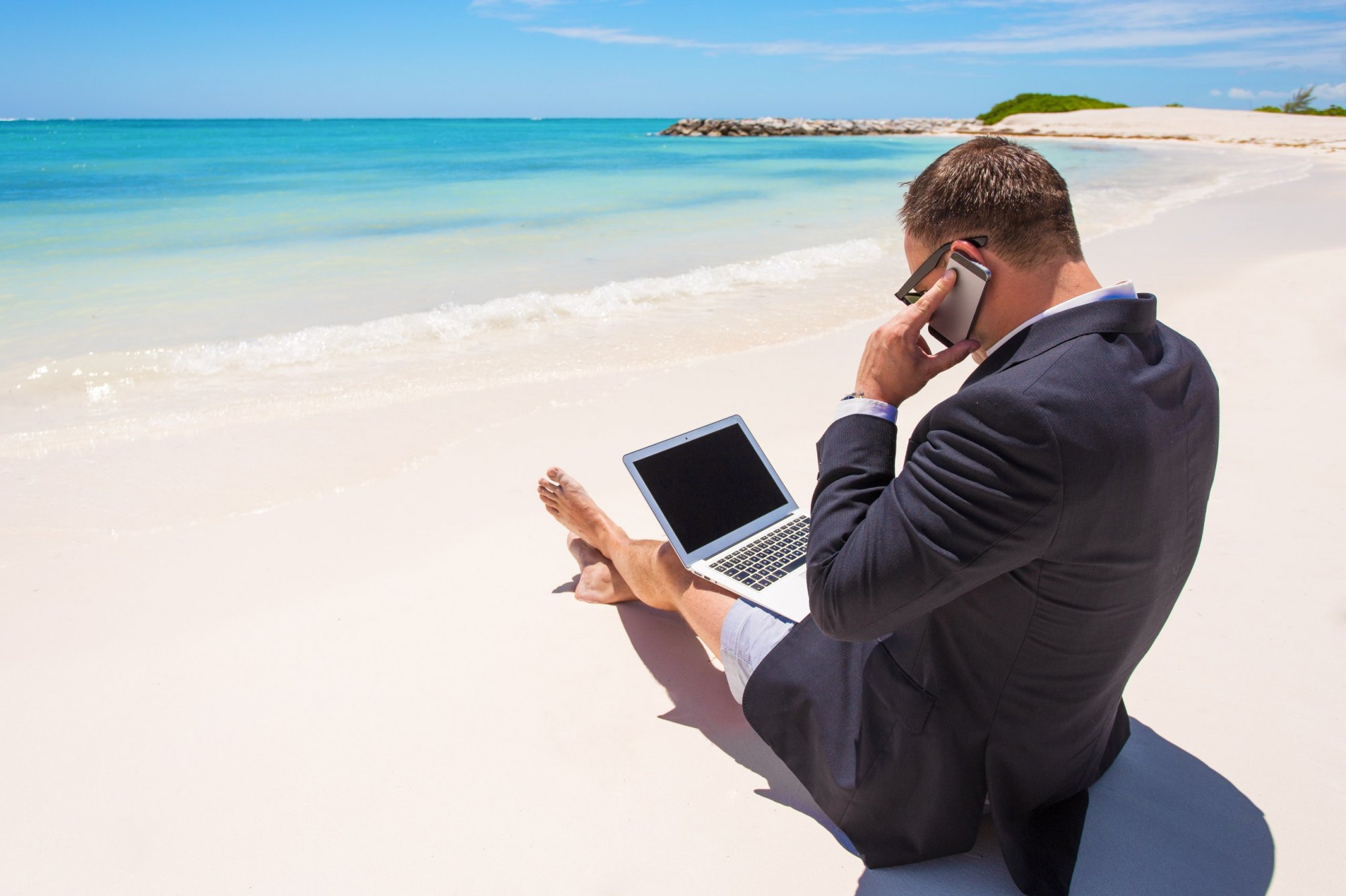 Ten companies that will let you work from anywhere and are hiring now