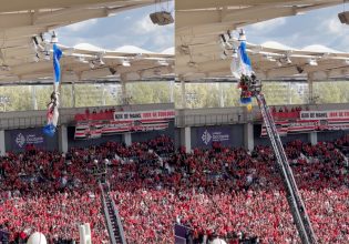 Αλεξιπτωτιστής μπλέχτηκε στο στέγαστρο σταδίου και κρεμόταν πάνω από τους θεατές