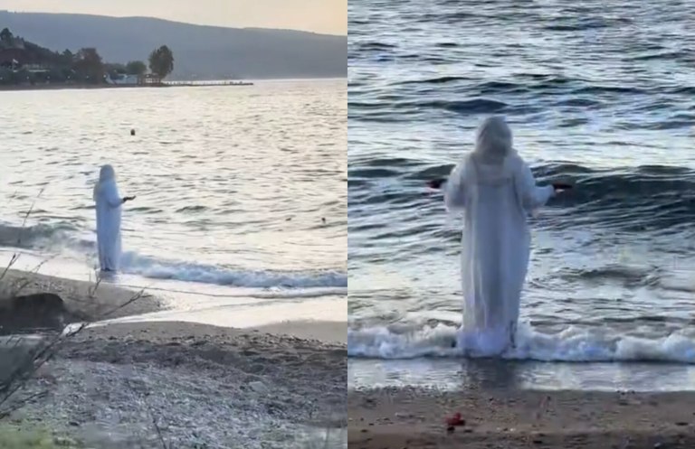 Το βίντεο που έγινε viral: Γυναίκα στα λευκά σε παράξενο τελετουργικό σε παραλία του Βόλου