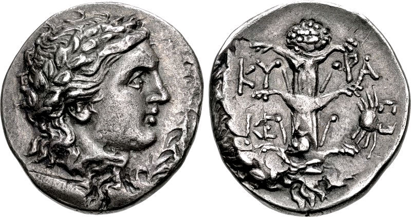 Νόμισμα του Μάγα της Κυρήνης (περ. 300–282/75 π.Χ.): στην πίσω όψη απεικονίζονται το σίλφιο και μικρά σύμβολα καβουριών.