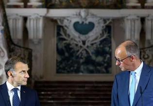 Macron, Merz Push to Revive Franco-German Defense Ties